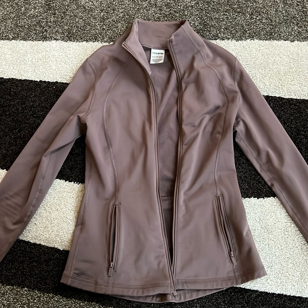 Pink brand zip up with thumb holes size xs. Excellent used condition.